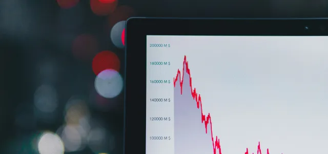 a computer screen with a red line on it by m. courtesy of Unsplash.