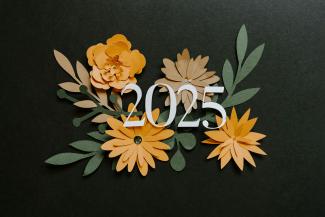 A close up of a number with flowers on it by Kelly Sikkema courtesy of Unsplash.