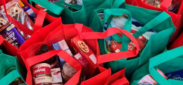 red and green plastic pack by Nico Smit courtesy of Unsplash.